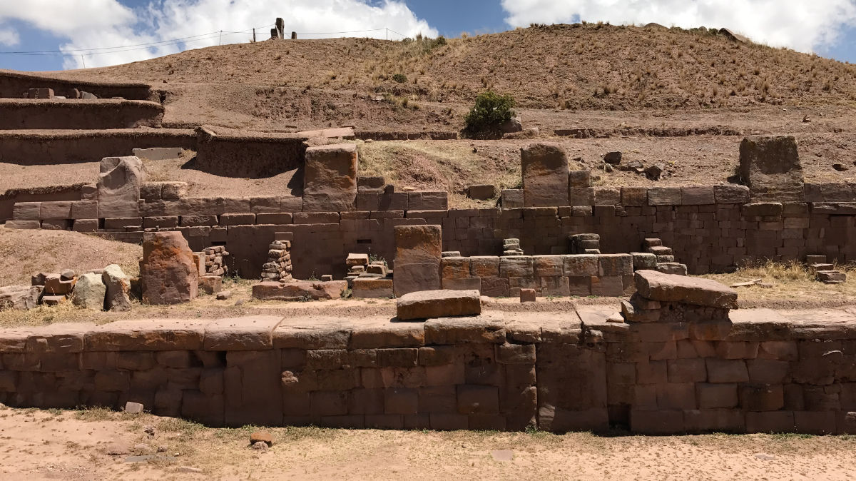 Ancient stone terraces and walls at Tiwanaku, Bolivia, showcasing the precise masonry and architectural skills of the Tiwanaku civilization.