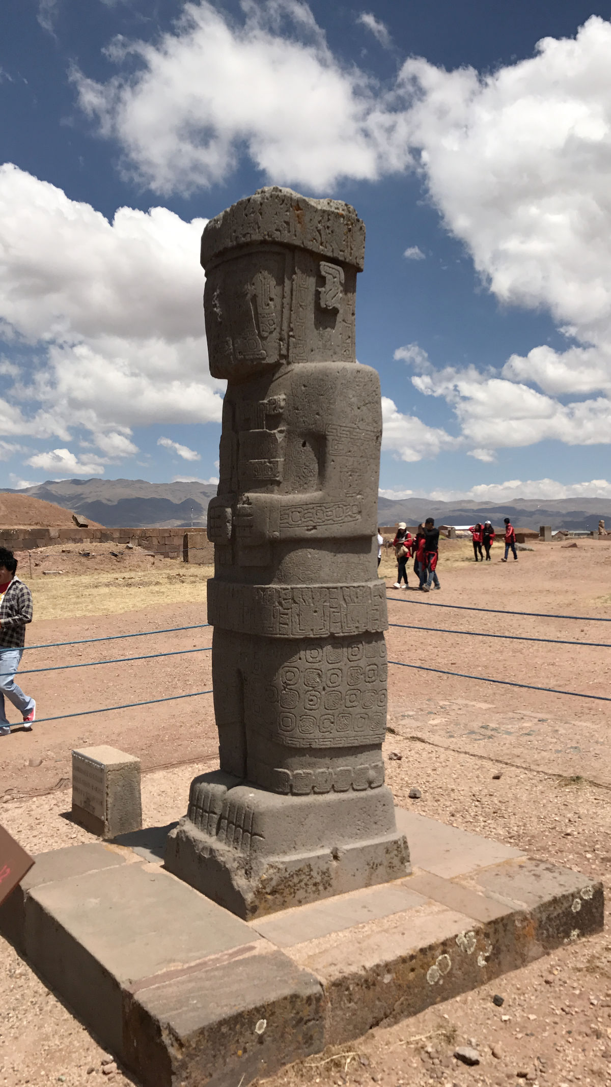 The monolith at Tiwanaku, Bolivia, is estimated to be around 1,000 to 1,800 years old, dating back to the height of the Tiwanaku civilization, which flourished from roughly 200 to 1000 AD.